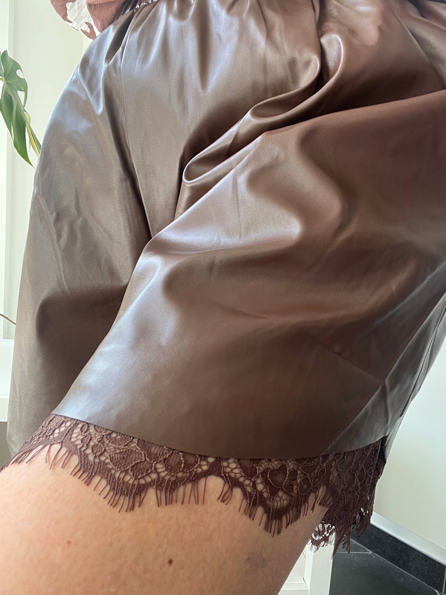 Short in leder