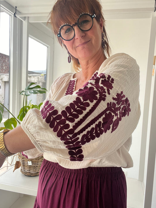 Bloes in broderie